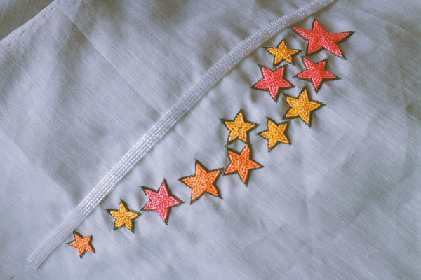 Dancing Stars, Neon Embroidery on Grey Linen