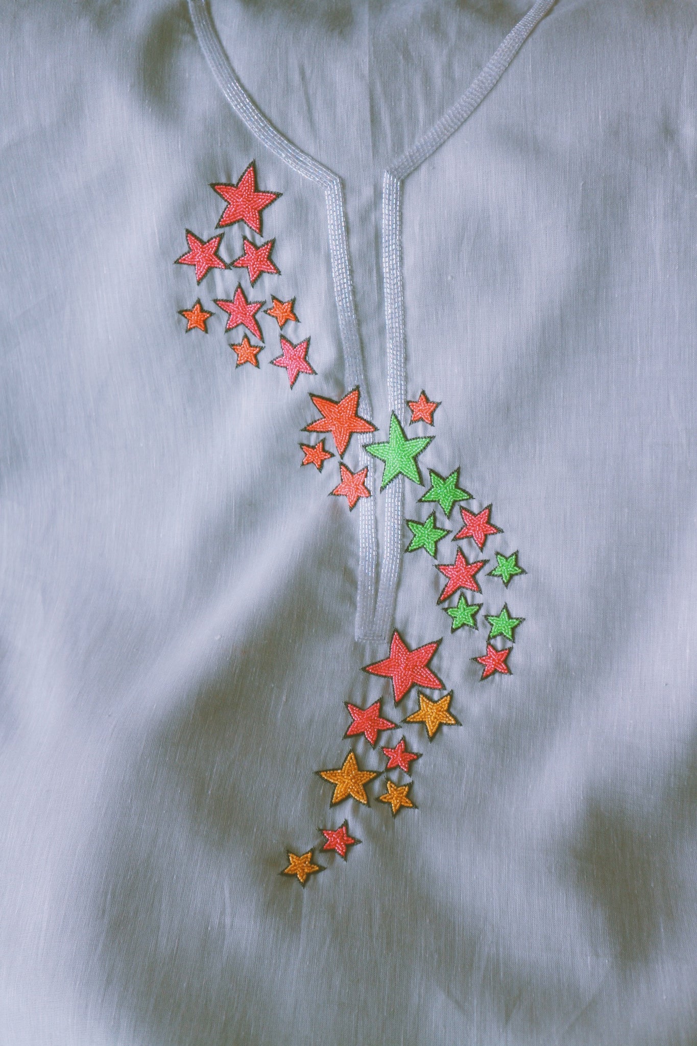Dancing Stars, Neon Embroidery on Grey Linen